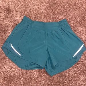 Teal green Lululemon Hotty Hot shorts 4”